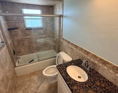 9393 Midnight Pass Road - Photo Thumbnail 26