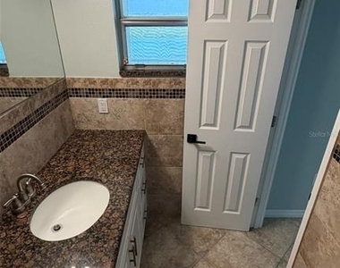 9393 Midnight Pass Road - Photo Thumbnail 20