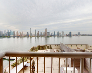 401 E 34th St - Photo Thumbnail 3