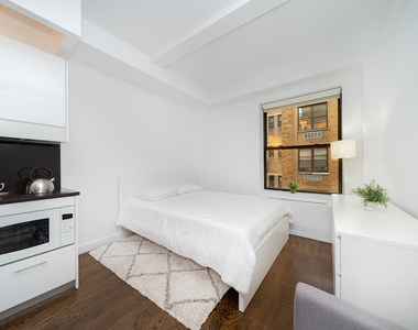 W 91ST ST - Photo Thumbnail 4