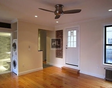 East 100th Street - Photo Thumbnail 3
