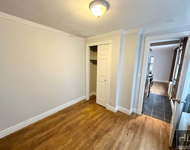 E 13th St. - Photo Thumbnail 5