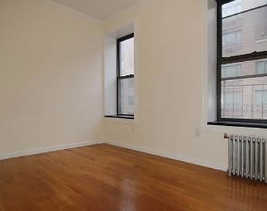 East 100th Street - Photo Thumbnail 2