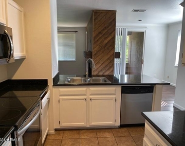 7009 E Acoma Drive - Photo Thumbnail 8