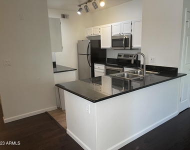 7009 E Acoma Drive - Photo Thumbnail 5