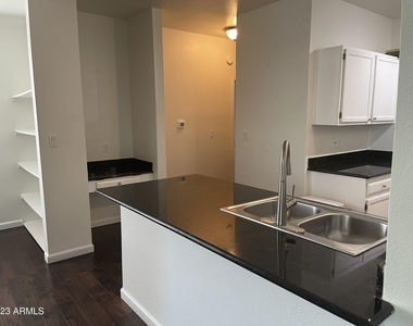 7009 E Acoma Drive - Photo Thumbnail 7