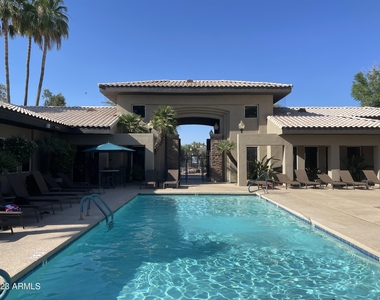 7009 E Acoma Drive - Photo Thumbnail 2