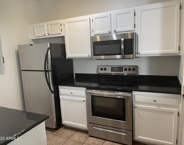 7009 E Acoma Drive - Photo Thumbnail 6