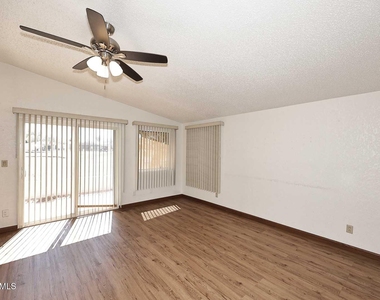 6249 S Pinehurst Drive - Photo Thumbnail 2