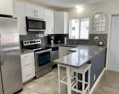 1528 Ne 32nd Street - Photo Thumbnail 3