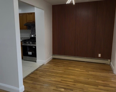 94-28 53 Avenue - Photo Thumbnail 1