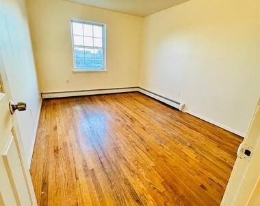 106-12 156th Street - Photo Thumbnail 5