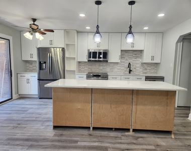 9242 Gross Point Road - Photo Thumbnail 2