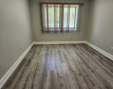 9242 Gross Point Road - Photo Thumbnail 8