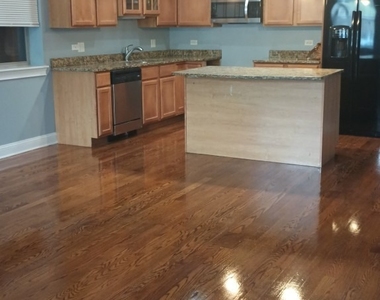 5911 W Corcoran Place - Photo Thumbnail 2