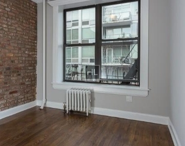 East 13th Street - Photo Thumbnail 3