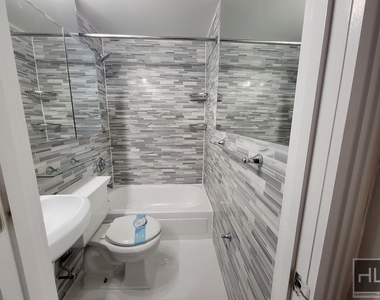 E 13th St. - Photo Thumbnail 5