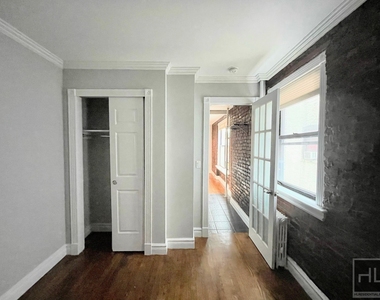 E 13th St. - Photo Thumbnail 3