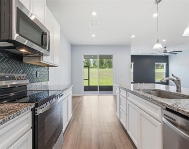 1210 Whispering Lane - Photo Thumbnail 2
