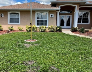 9461 Miami Circle - Photo Thumbnail 1