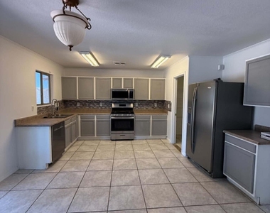 1261 E Dust Devil Drive - Photo Thumbnail 1