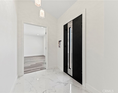 8832 Odessa Ave - Photo Thumbnail 1
