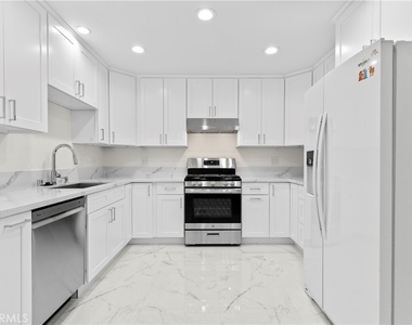 8832 Odessa Ave - Photo Thumbnail 3