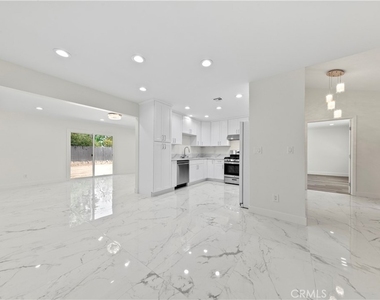 8832 Odessa Ave - Photo Thumbnail 2