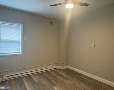 694 N Delaware Street - Photo Thumbnail 2