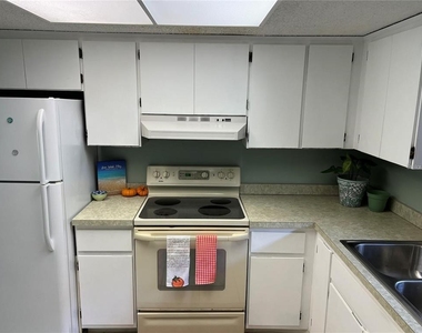 1100 E Bay Drive - Photo Thumbnail 1