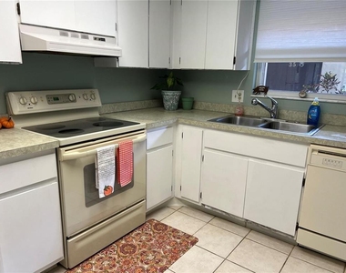 1100 E Bay Drive - Photo Thumbnail 2