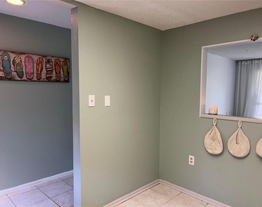 1100 E Bay Drive - Photo Thumbnail 3