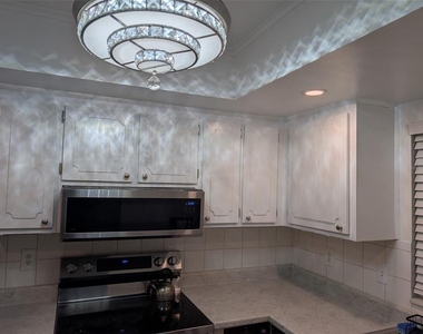 1100 E Bay Drive - Photo Thumbnail 1