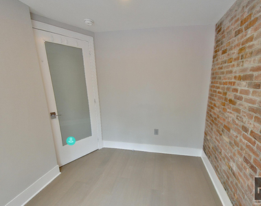 E 12th St. - Photo Thumbnail 5