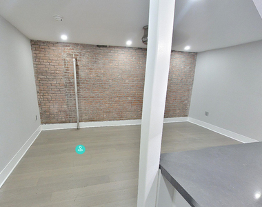 E 12th St. - Photo Thumbnail 2