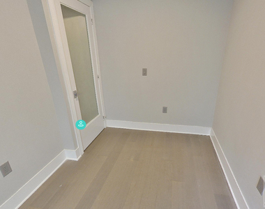 E 12th St. - Photo Thumbnail 3