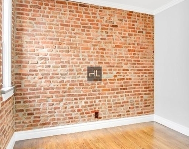 E 13th St. - Photo Thumbnail 3