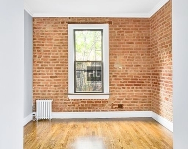 E 13th St. - Photo Thumbnail 2