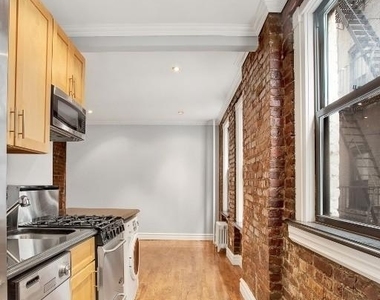E 13th St. - Photo Thumbnail 1