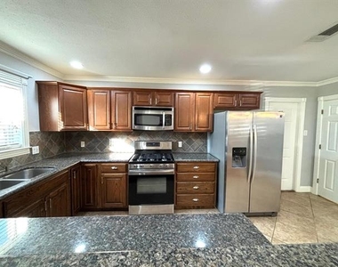 9418 Lenel Place - Photo Thumbnail 4