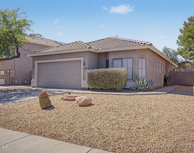 8868 W Laurel Lane - Photo Thumbnail 2