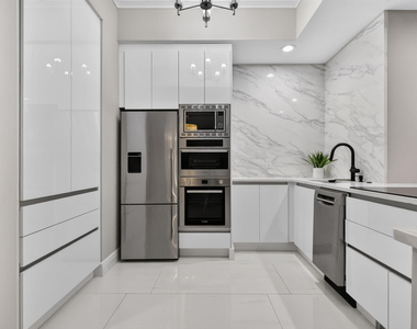 701 S Olive Avenue - Photo Thumbnail 3