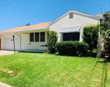 9459 Workman Avenue - Photo Thumbnail 2