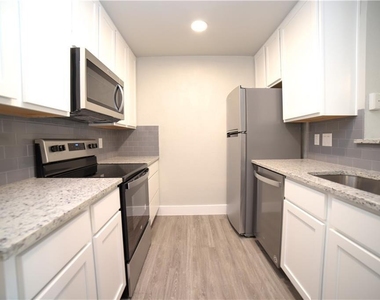 114 E 31st St - Photo Thumbnail 4