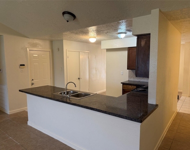 8307 Bird Meadow Lane - Photo Thumbnail 3