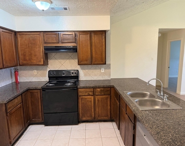8307 Bird Meadow Lane - Photo Thumbnail 4
