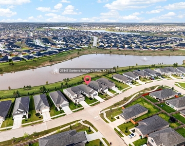 27447 Sunterra Village Drive - Photo Thumbnail 1