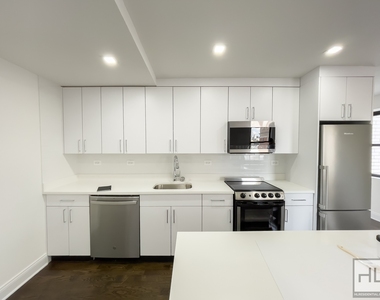 E 16 St - Photo Thumbnail 3