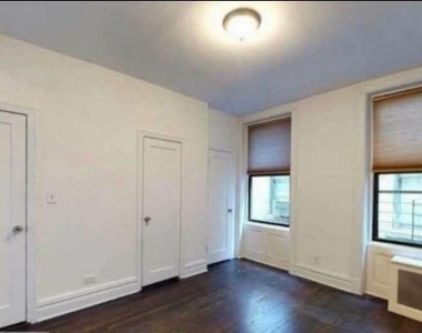 East 91 Street - Photo Thumbnail 2