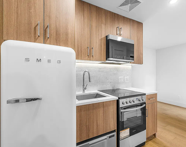 236 West 15th Street - Photo Thumbnail 1